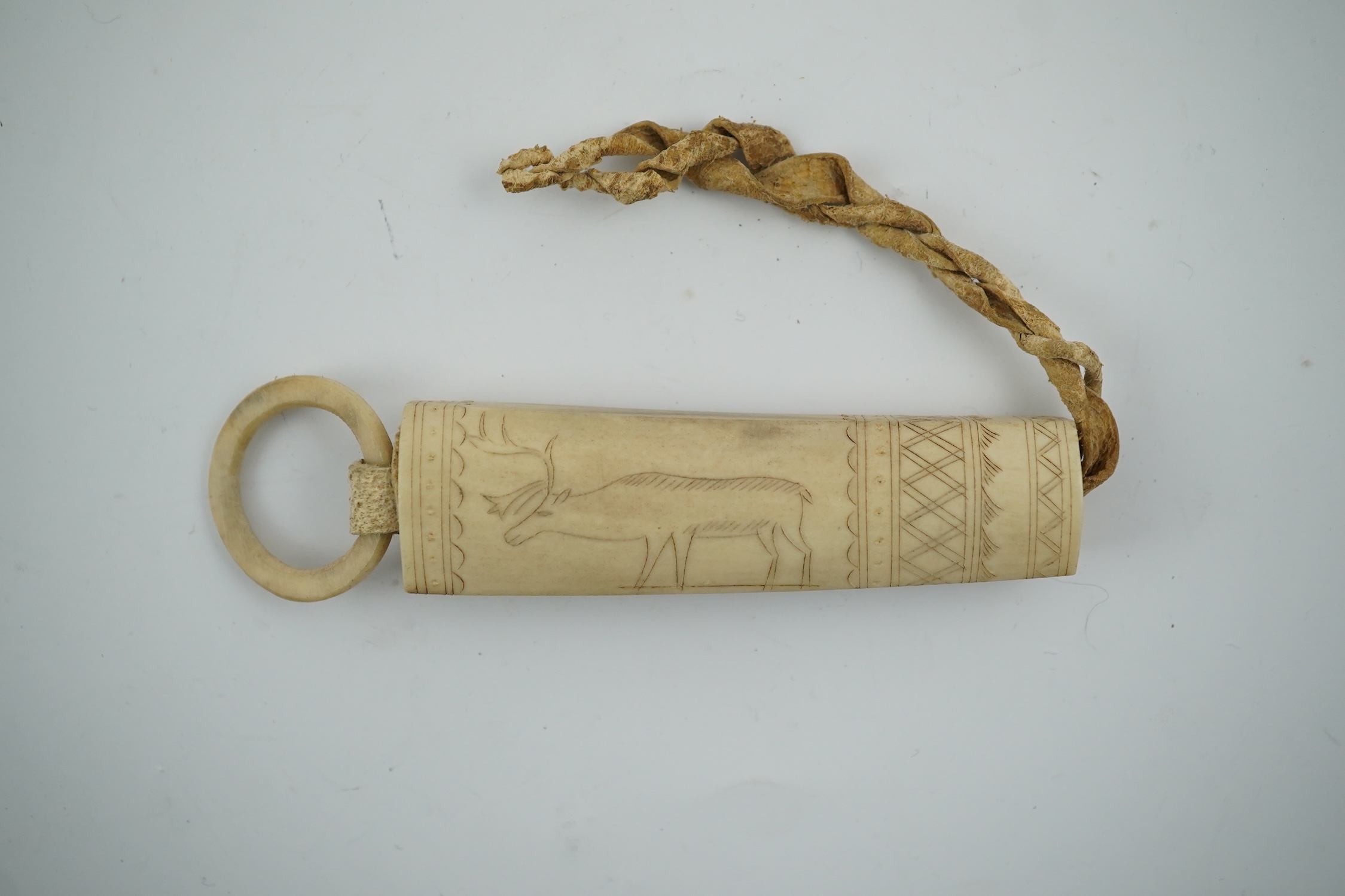 A Sami carved reindeer antler needle case, 10cm high., Condition - good